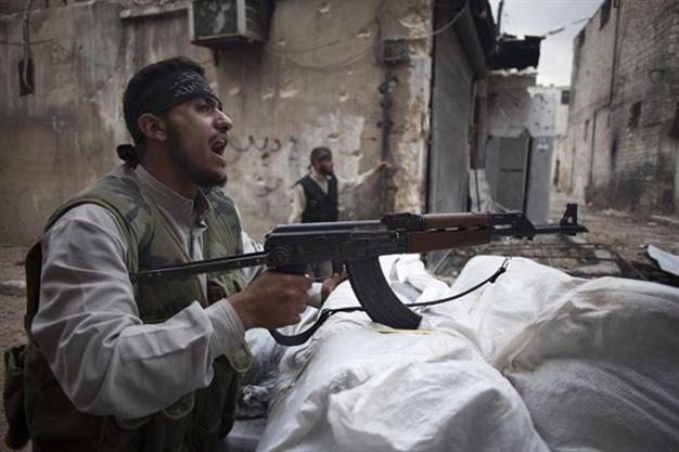 Syria rebels attack in Aleppo, clash with Kurds near Turkey