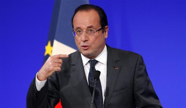 World will react if Syria uses chemical weapons: France
