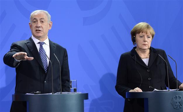 Merkel says disagrees with Israel on settlements