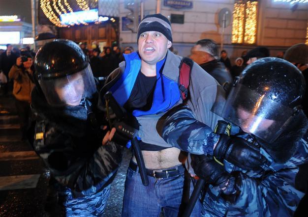 Russian police search filmmakers home in rally probe