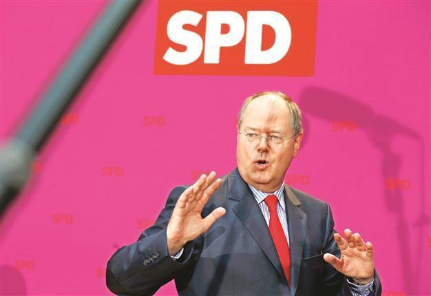 SPD launches poll bid against Merkel