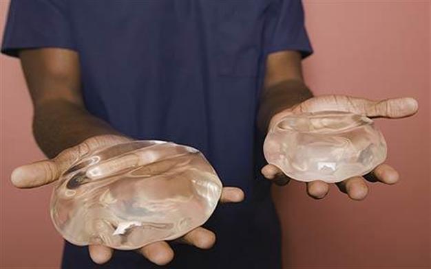 Spain arrests woman with cocaine breast implants