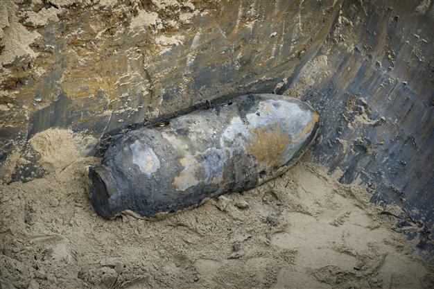 WWII bomb found near Japan runway halts flights