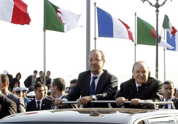 Hollande faces France’s bitter colonial past in Algeria