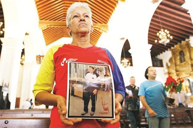 Hugo Chavez’s health improves after surgery