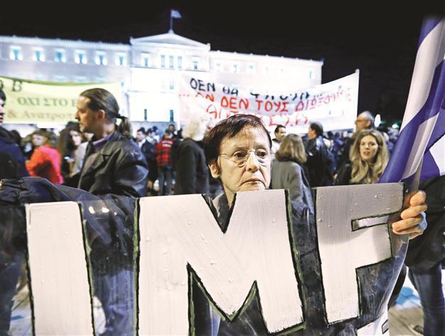 Greece goes easy on tax dodgers: lenders