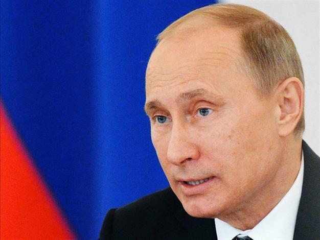 Putin signs anti-US adoption law: Kremlin