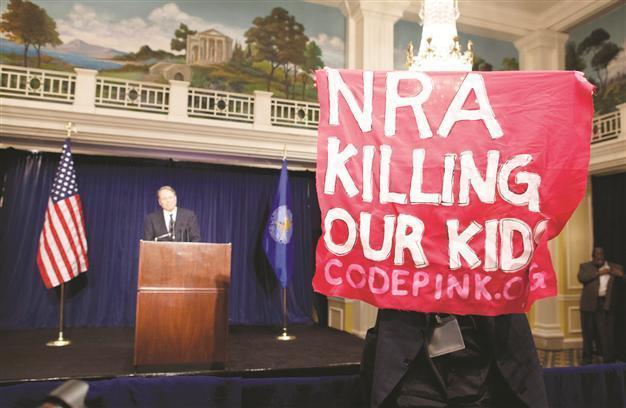 Gun lobby asks for more guns to end mass shootings in US