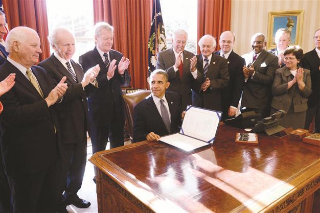 Obama asked to retaliate on Moscow’s adoption ban