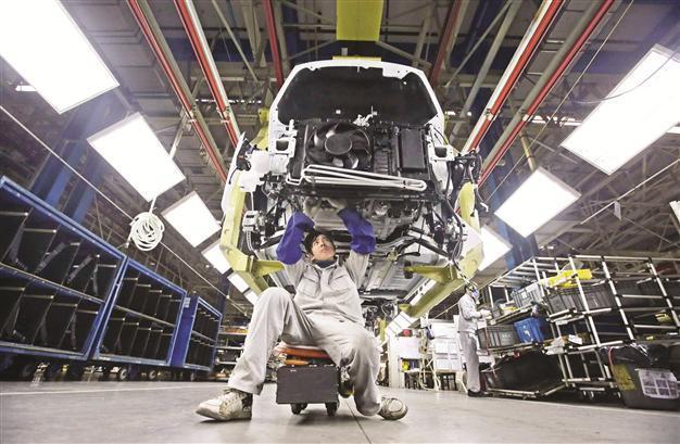 Peugeot blames eurozone crisis for sale drop