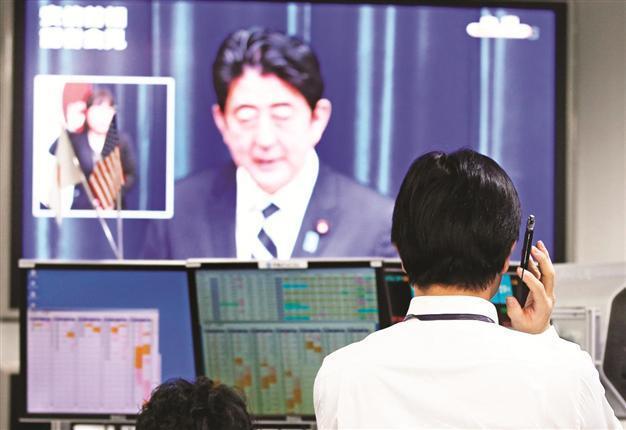 Japan approves $224 bln stimulus