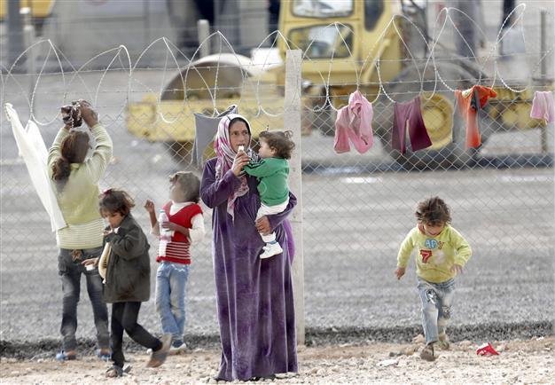 Turkey to be granted residence permit to Syrians with passports