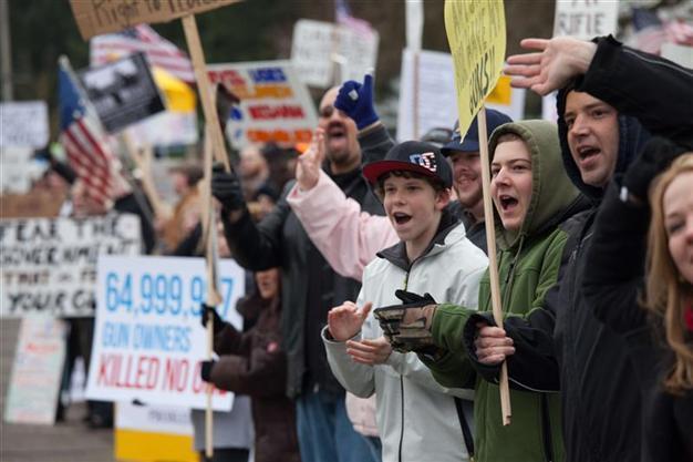 US gun supporters rally as five more hurt in shootings