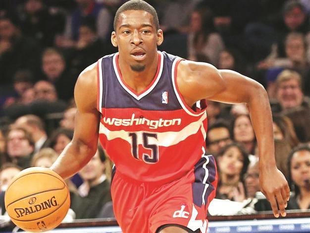 Crawford leads as lowly Wizards cool down Heat