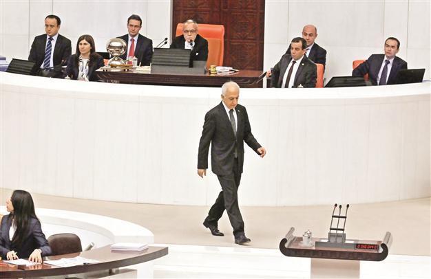 Ombudsman takes oath amid protests