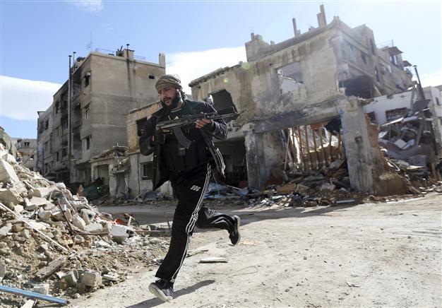 Syria warplanes raid Damascus province, blackout eases