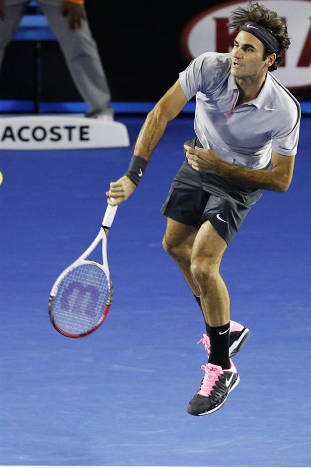Federer, Murray show no mercy