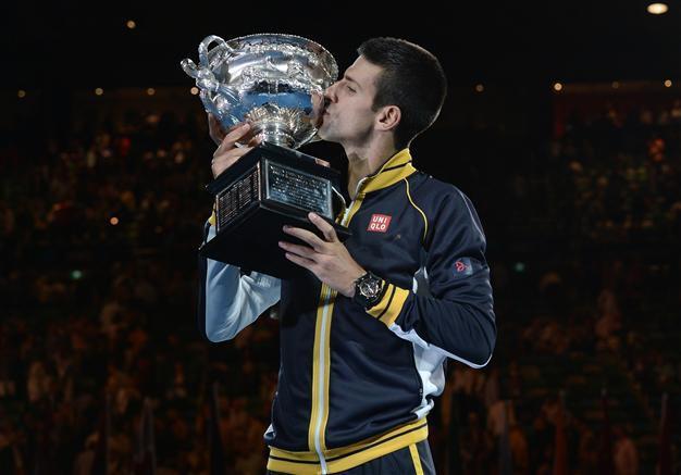 Supreme Djokovic grinds down Murray for three-peat