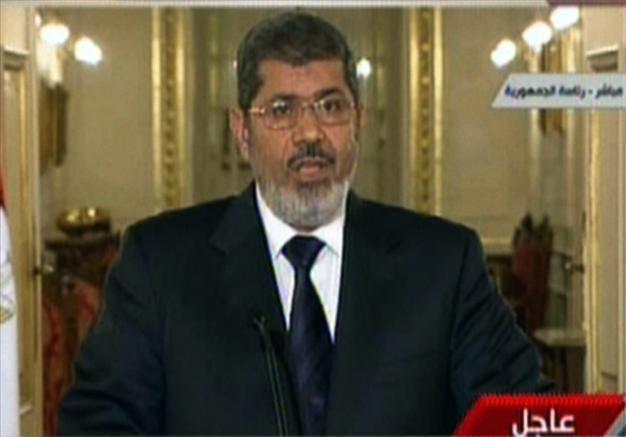 Cabinet approves draft law allowing Morsi to deploy army