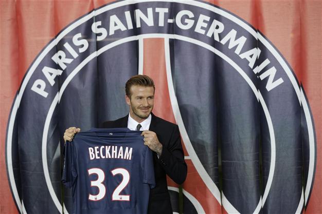 Beckham signs for PSG, donates salary to charity