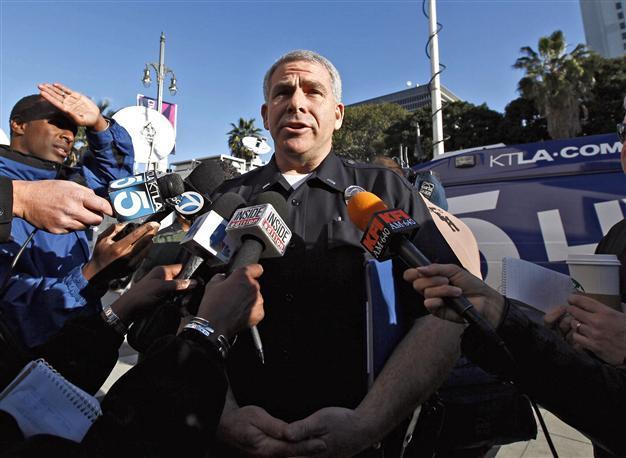 Fugitive ex cop reported in US mountain shootout