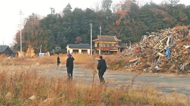 Japan continues massive cleanup