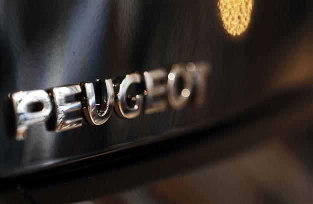 Peugeot unveils historic 5 billion euro loss for 2012