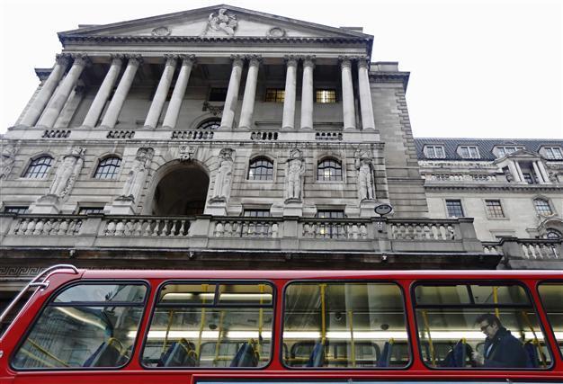Britain insists on austerity despite AAA loss