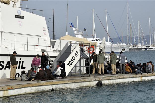 Dozens escape drowning after refugee boats capsize in Aegean Sea