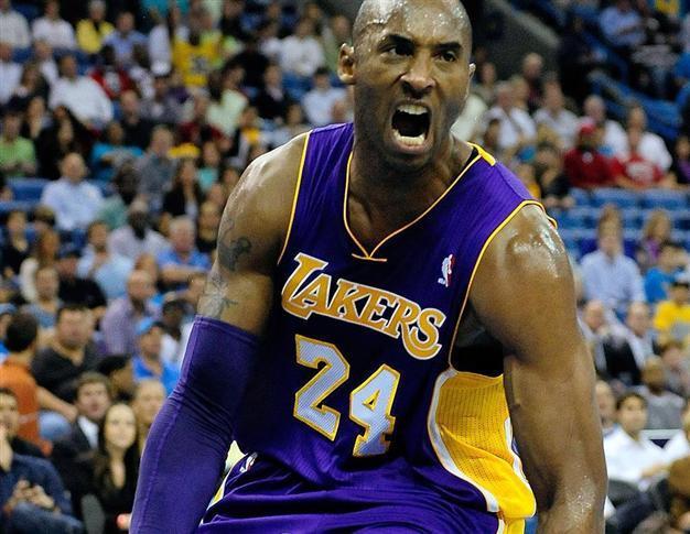 Kobe reaches milestone in win