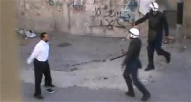 Video showing protester standing against police stuns Bahrain
