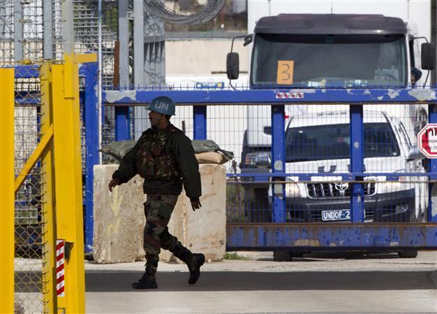 Syrian rebels say no talks under way to free UN peacekeepers