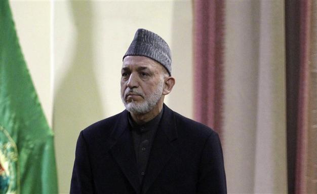 Afghan president condemns NATO killing of two boys