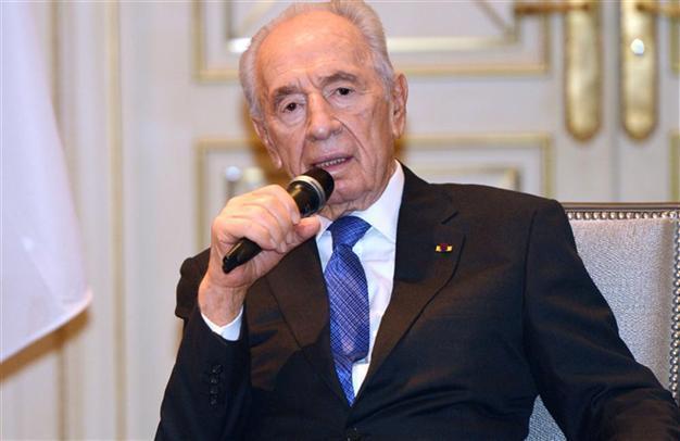 Israels Peres urges Syria intervention by Arab force