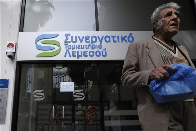 Greek Cyprus postpones debate on controversial EU bailout