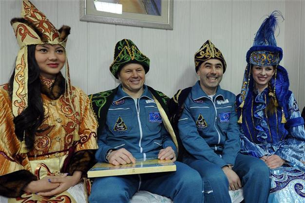 Astronauts return to Earth from space station