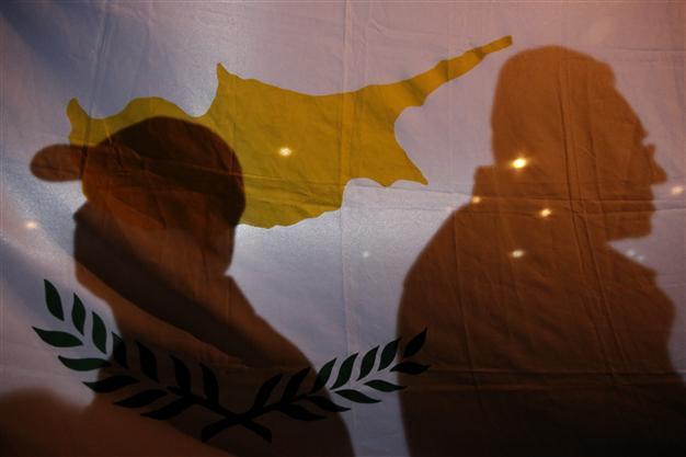 Greek Cyprus says banks to reopen with tight controls