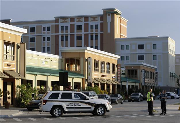 US university says bomb attack plotter found dead