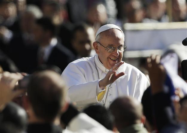 Pope sets tone for humbler papacy, calls for defence of the weak