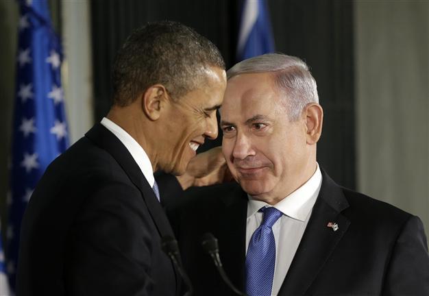 Obama pledges resolve against Irans nuclear aims on his first visit to Israel