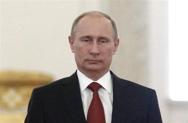 Putin orders cabinet to study restructuring Greek Cyprus loan