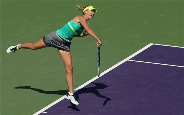 Sharapova beats Vesnina to reach 4th round