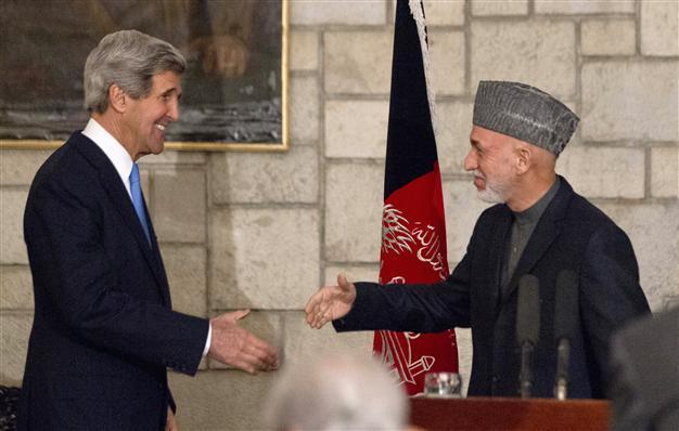 Kerry, Karzai bury hatchet in Kabul meeting
