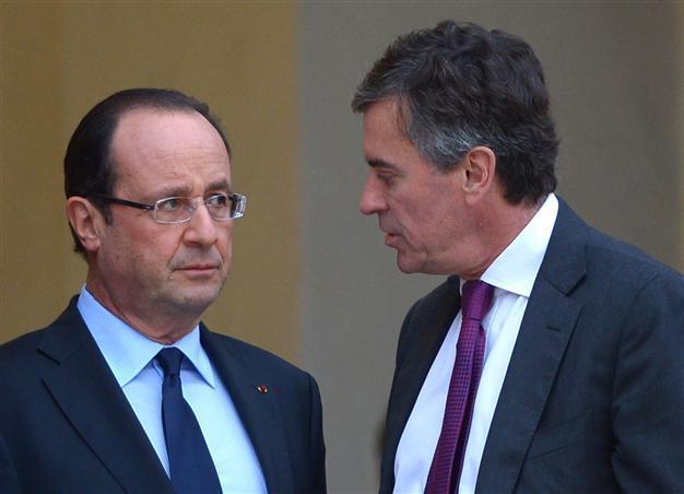 Blow for Hollande as ex-minister charged in tax fraud probe