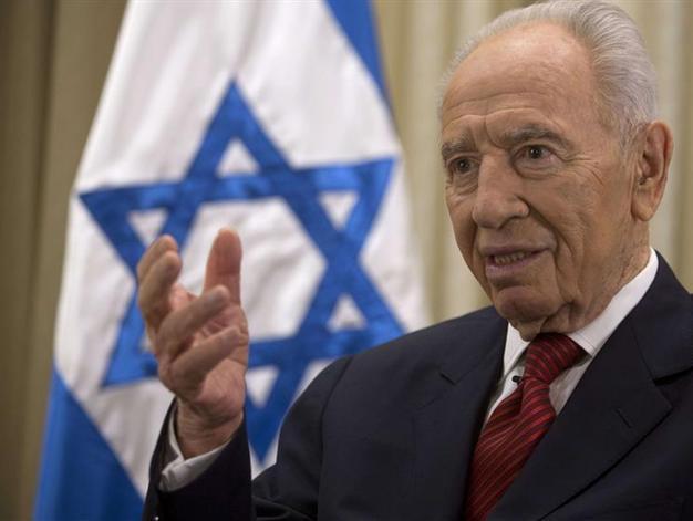 Iran danger threatens Israel existence, world peace: Peres