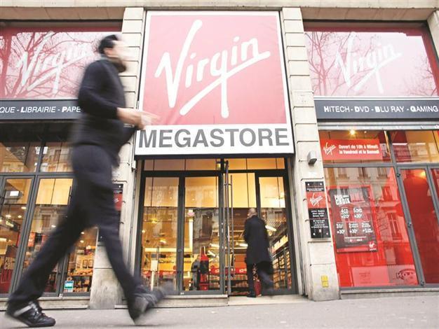 Liberty Global to buy Virgin Media