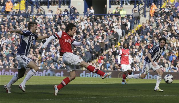 Arsenals fighting spirit gives Wenger hope