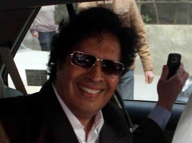Egypt to try detained Gadhafi cousin, wanted in Libya