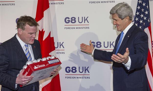 Canada FM loses beer bet to Kerry on ice hockey