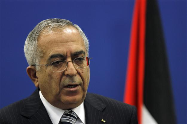 Palestinian president under pressure to back Fayyad